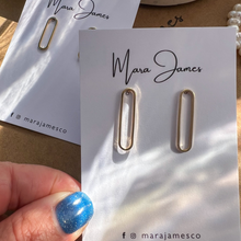 Load image into Gallery viewer, Gold-plated oval hoop stud earrings in short and long sizes on Mara James jewelry card