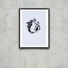Load image into Gallery viewer, Framed artwork of two fish in a circle on a white background, mounted on a textured gray wall.
