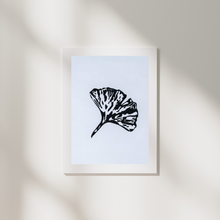 Load image into Gallery viewer, Framed artwork of a black leaf on a light blue background