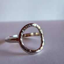 Load image into Gallery viewer, Silver ring with a circular design on a light background
