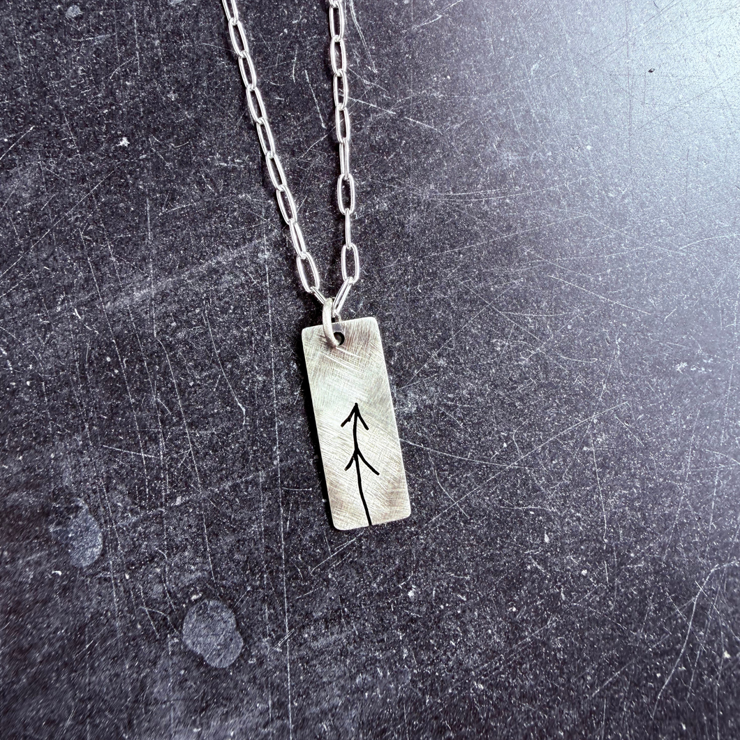 Artisan sterling silver symbolic necklace on link chain