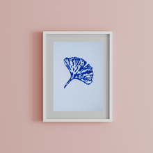 Load image into Gallery viewer, Framed artwork with a blue leaf design on a pink background

